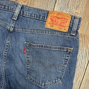 Levis 502 Regular Taper Jeans Mens 34x30 Blue Denim Distressed Medium Wash